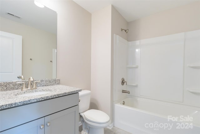 full bath featuring toilet, shower / bath combination, visible vents, and vanity