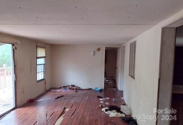 interior space featuring hardwood / wood-style flooring and a healthy amount of sunlight