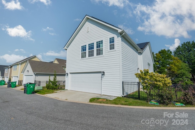 view of home's exterior featuring a garage