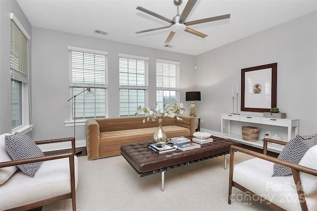 living room featuring ceiling fan