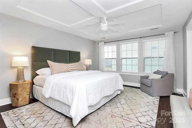 bedroom featuring ceiling fan, coffered ceiling, and light hardwood / wood-style flooring