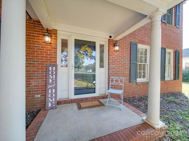 doorway to property with covered porch