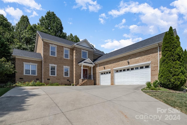 view of front of home with a garage