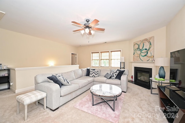 living room featuring ceiling fan and light carpet