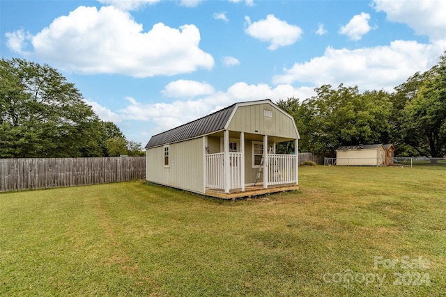 view of outdoor structure with a yard