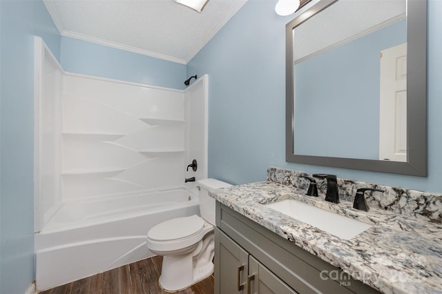 full bathroom with hardwood / wood-style floors, shower / bathing tub combination, a textured ceiling, and ornamental molding