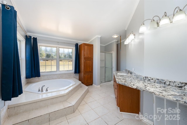 bathroom featuring tile patterned floors, vanity, shower with separate bathtub, and ornamental molding