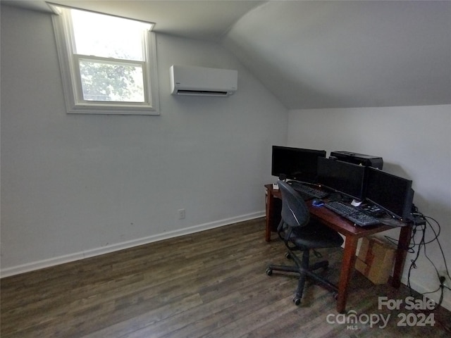 office featuring lofted ceiling, hardwood / wood-style floors, and an AC wall unit