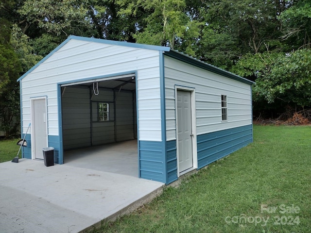 view of outbuilding featuring a lawn