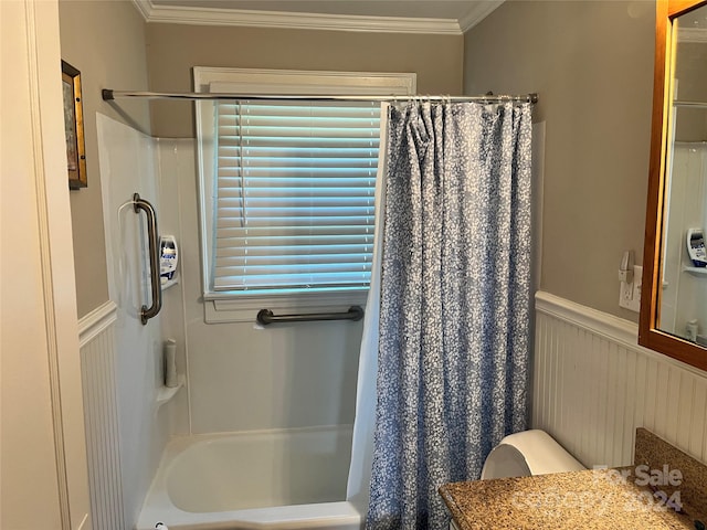 full bathroom featuring shower / bath combo, toilet, ornamental molding, and vanity