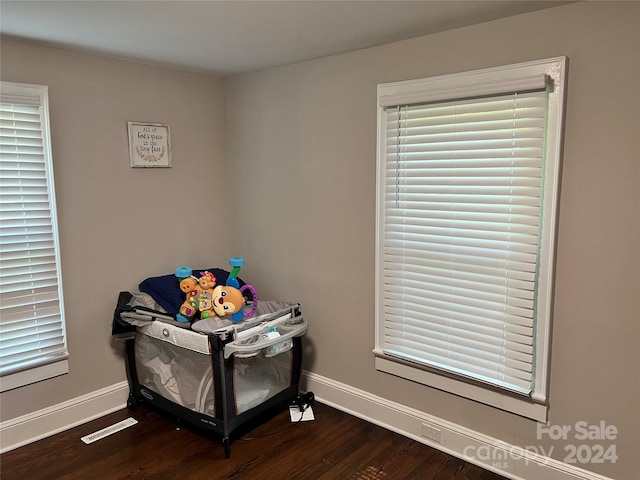 interior space with hardwood / wood-style flooring