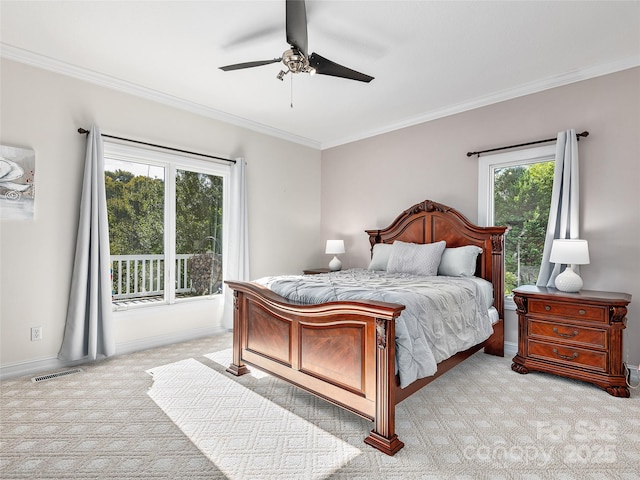 bedroom featuring light carpet, ceiling fan, and ornamental molding