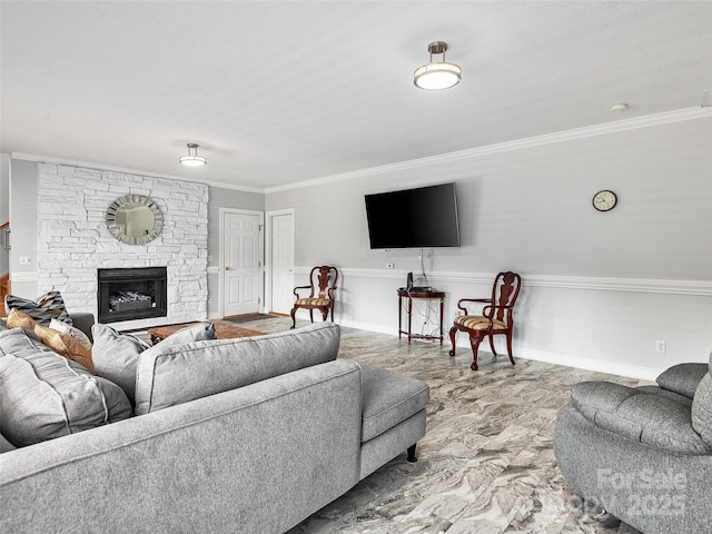 living room featuring ornamental molding and a stone fireplace