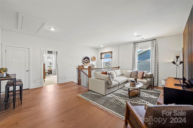 living room with light hardwood / wood-style floors