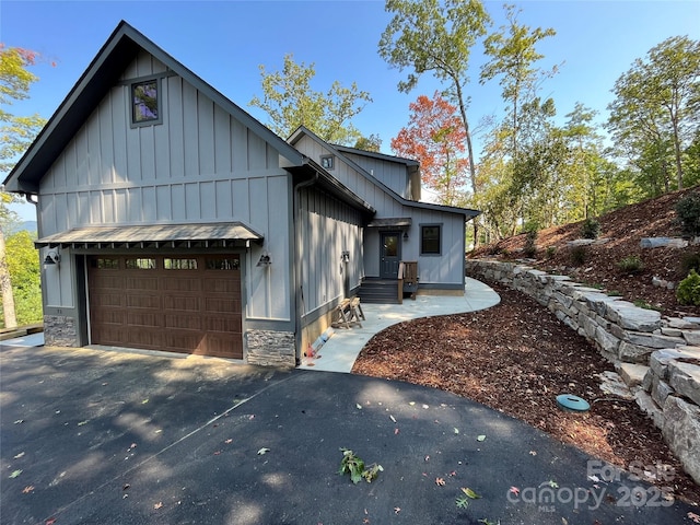 view of front of property with a garage