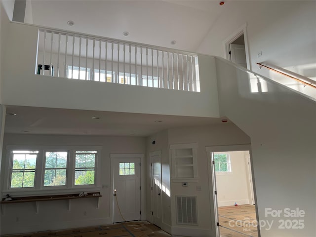 71 Crossings Cir, Fairview, NC 28730 - foyer with healthy amount of natural light and a towering ceiling