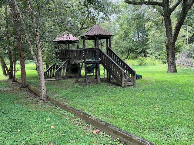 view of playground featuring a yard