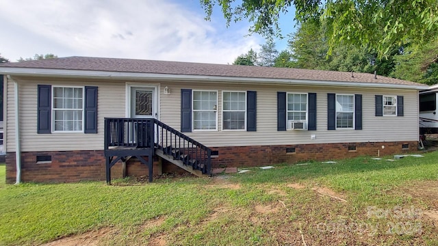 manufactured / mobile home featuring a front yard