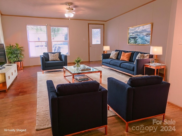 living room with ceiling fan, ornamental molding, and hardwood / wood-style floors