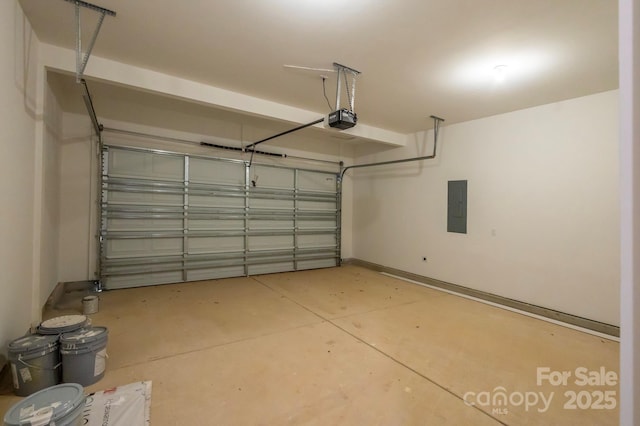 garage featuring electric panel and a garage door opener