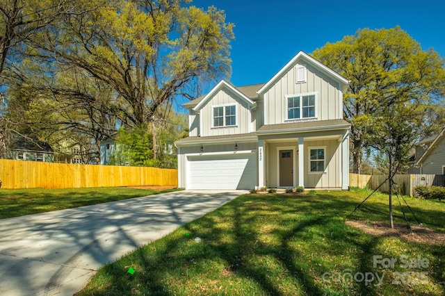 2630 Rose St, Charlotte, NC 28208 - traditional-style house with concrete driveway, board and batten siding, a front lawn, and an attached garage