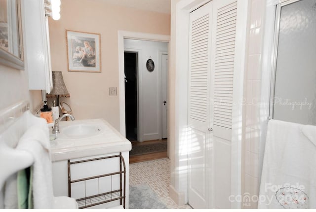 full bathroom with vanity