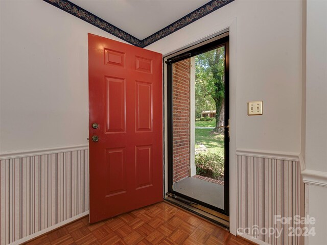 entrance foyer with light parquet flooring