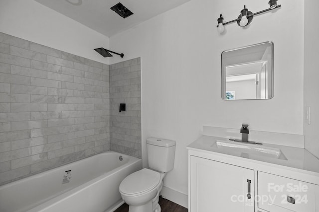 full bathroom featuring baseboards, shower / tub combination, vanity, and toilet