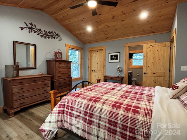 bedroom featuring light hardwood / wood-style floors, lofted ceiling, ceiling fan, and wood ceiling