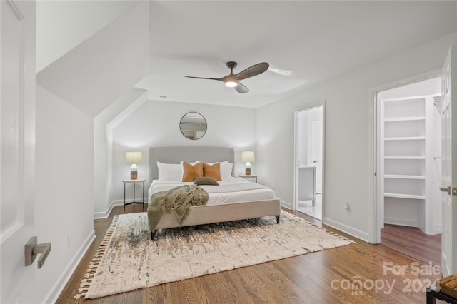 bedroom featuring ceiling fan and hardwood / wood-style flooring