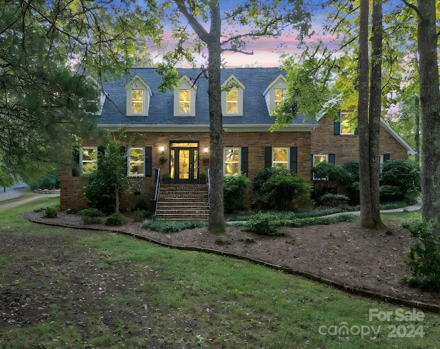 view of new england style home