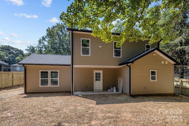 back of house featuring a patio area