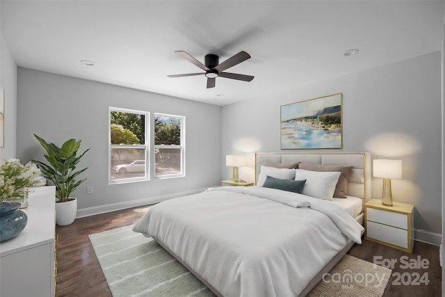 bedroom featuring dark wood-type flooring and ceiling fan