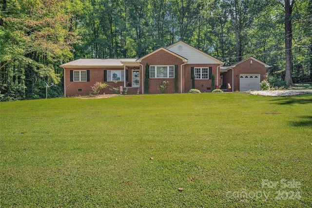 ranch-style house featuring a garage, crawl space, brick siding, and a front lawn