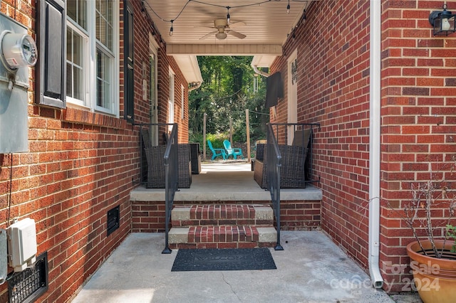 view of patio with ceiling fan and a porch