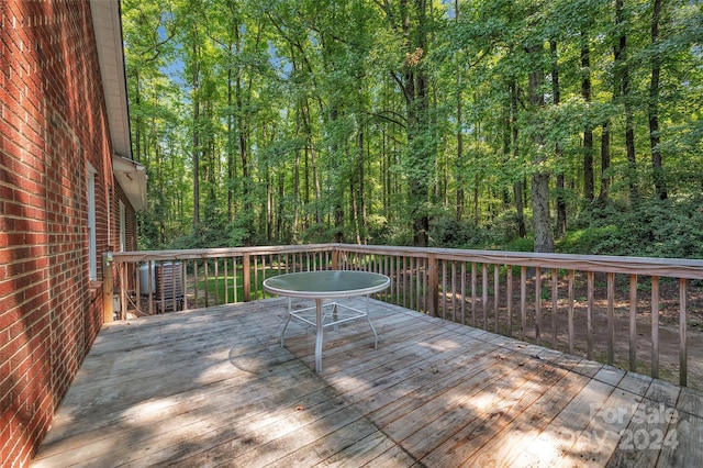 deck with a wooded view