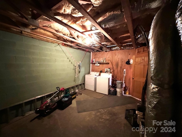 basement featuring washing machine and clothes dryer