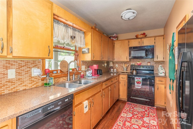 kitchen with black appliances, sink, backsplash, and dark wood-type flooring