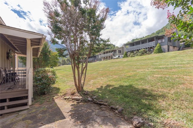 view of yard with a deck