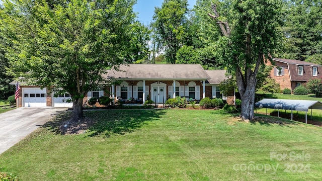 ranch-style house with a porch, a carport, a front lawn, and a garage