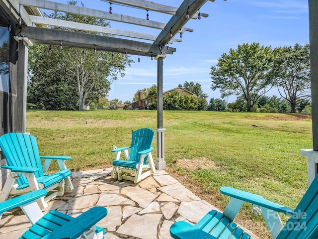 view of patio / terrace featuring a pergola