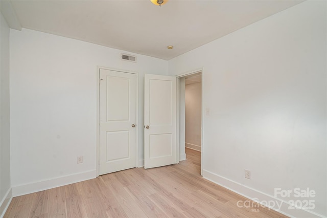 unfurnished bedroom with light hardwood / wood-style flooring