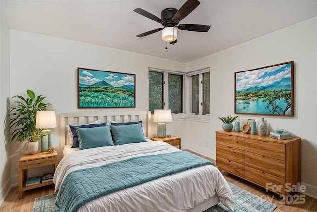 bedroom featuring ceiling fan and light wood-type flooring