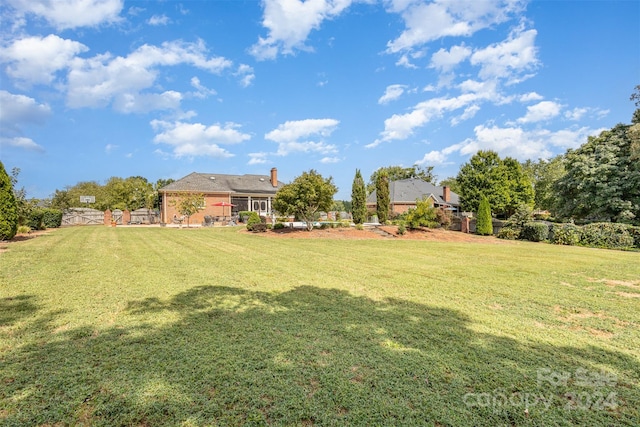 view of yard with fence