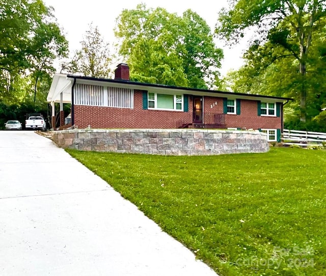 view of front of home with a front yard