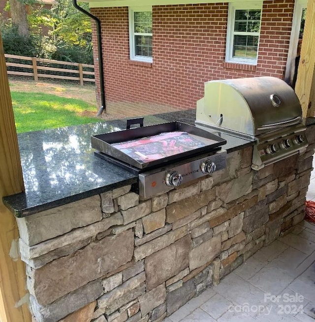 exterior space with area for grilling