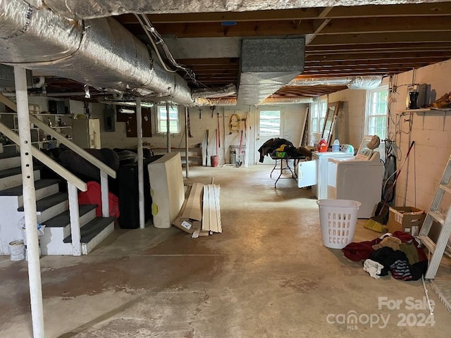 basement with plenty of natural light and washer and dryer