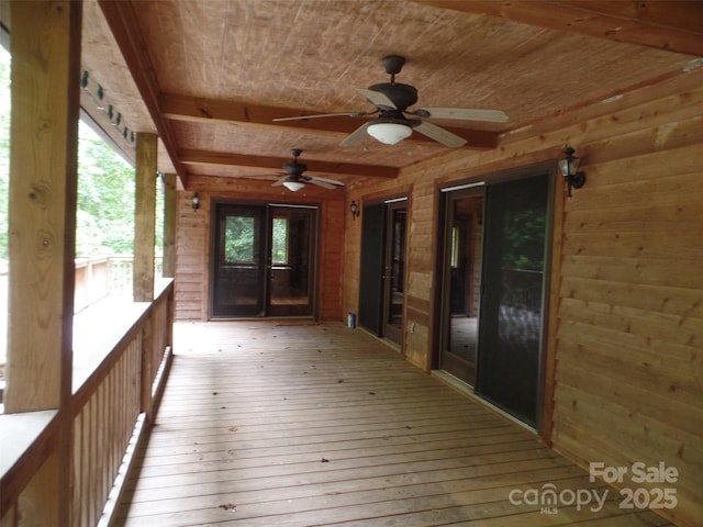 721 Kuenzel Eller Dr, Millers Creek, NC 28651 - unfurnished sunroom featuring beamed ceiling