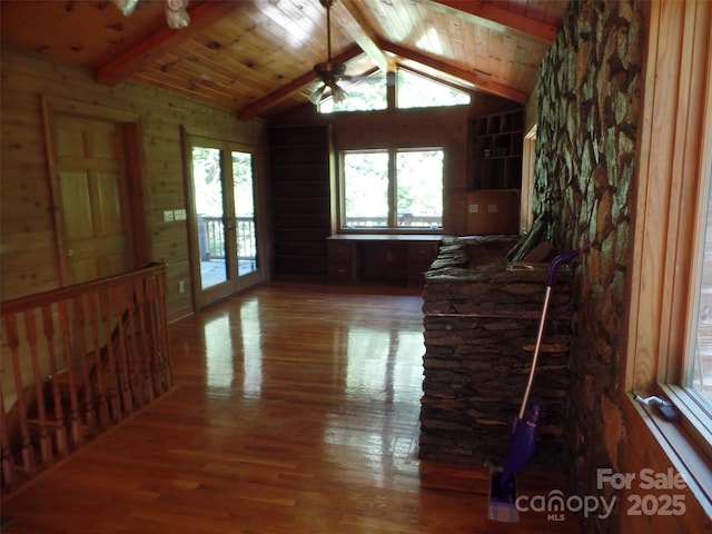 721 Kuenzel Eller Dr, Millers Creek, NC 28651 - unfurnished living room featuring wood finished floors, a ceiling fan, and wooden ceiling