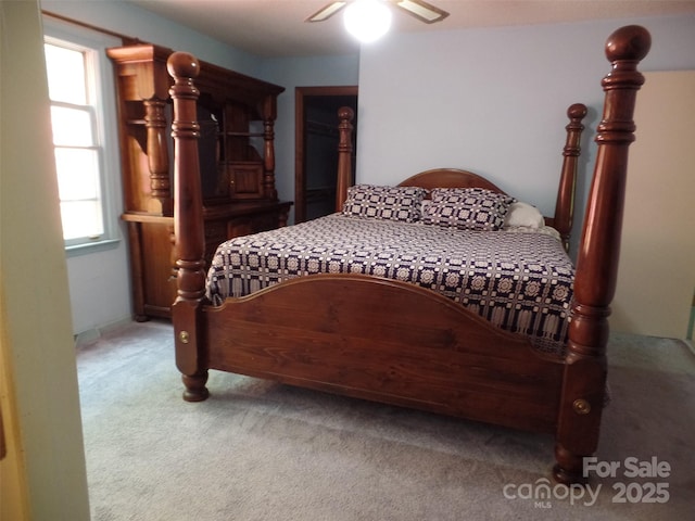 721 Kuenzel Eller Dr, Millers Creek, NC 28651 - carpeted bedroom with a ceiling fan